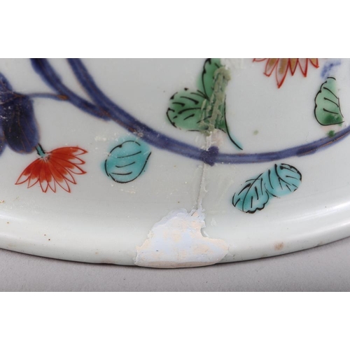 140 - An Imari decorated deep bowl, 11