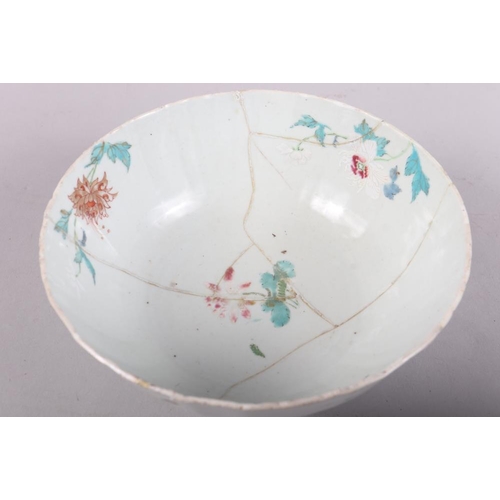 140 - An Imari decorated deep bowl, 11