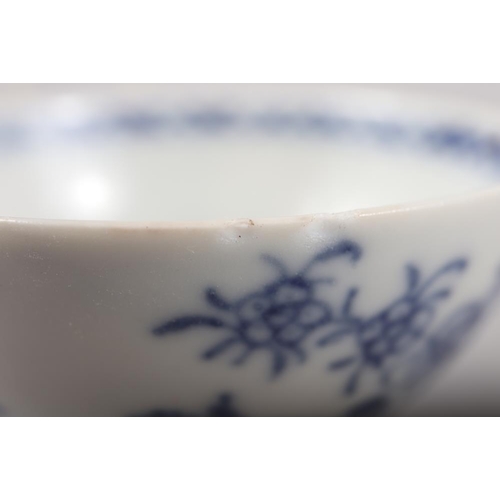 144 - A Chinese porcelain ogee-shaped tea bowl and saucer with blue and white floral decoration, tea bowl,... 