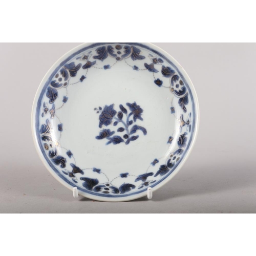 147 - A Chinese blue and white saucer dish with pheasant and tree design, 11