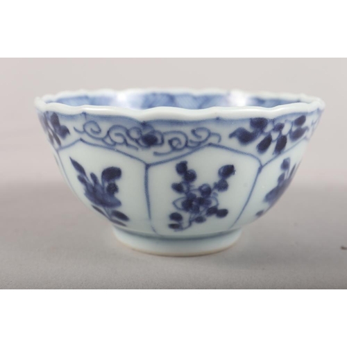 147 - A Chinese blue and white saucer dish with pheasant and tree design, 11