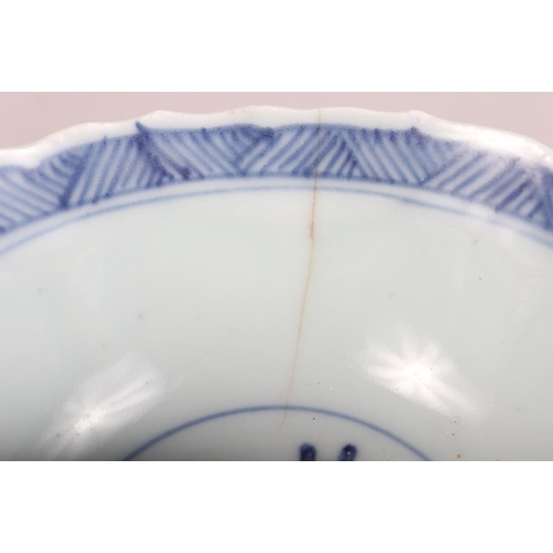 147 - A Chinese blue and white saucer dish with pheasant and tree design, 11