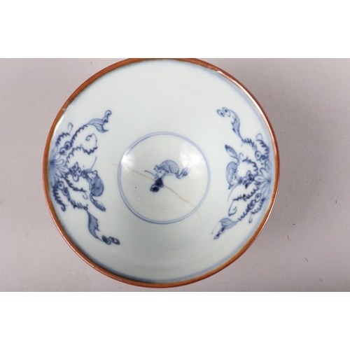 147 - A Chinese blue and white saucer dish with pheasant and tree design, 11