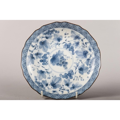 147 - A Chinese blue and white saucer dish with pheasant and tree design, 11