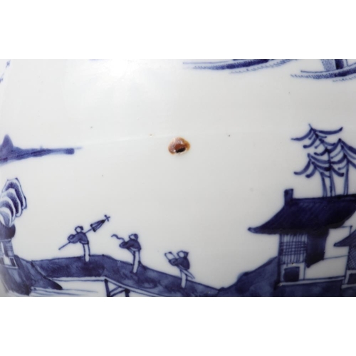 149 - A Chinese porcelain blue and white landscape decorated jar and cover with Dog of Fo finial, 17 1/2