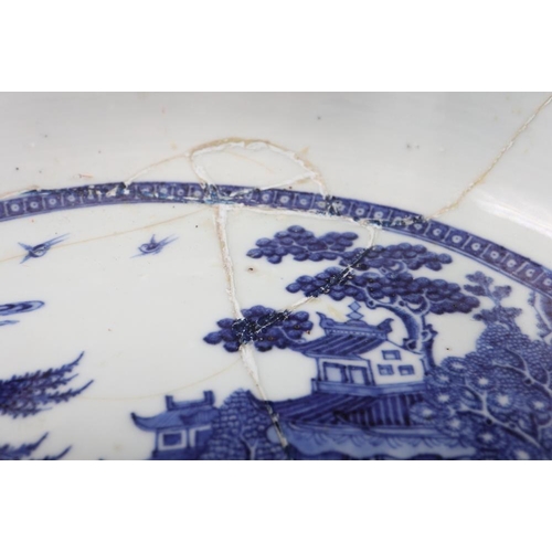 151 - A Chinese porcelain blue and white landscape decorated two-handled tureen, 12 1/2