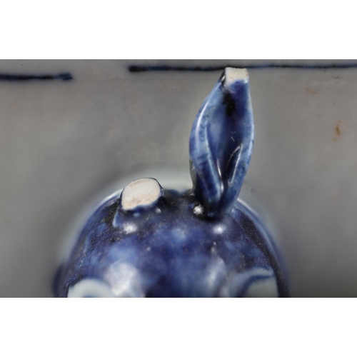 152 - A Chinese porcelain blue and white boars' head two-handled tureen and cover with floral decoration, ... 