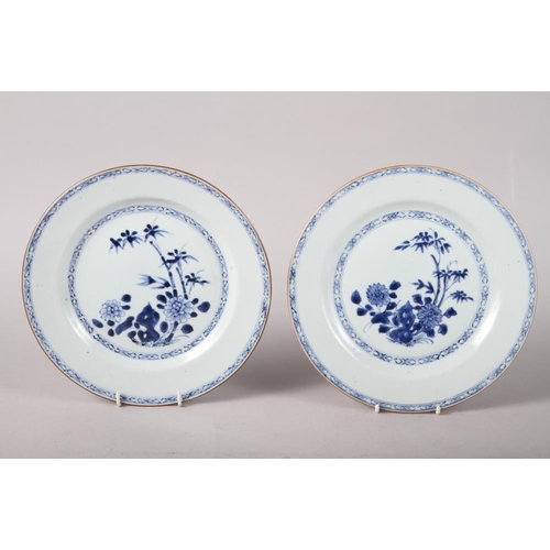 156 - Four 19th century Chinese export plates decorated flowers and trees, 9