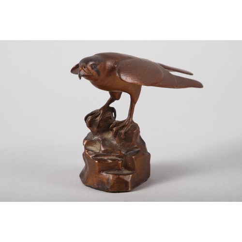 186 - Dave Tomlinson: a signed limited edition bronze, hawk perched on a rock, 4