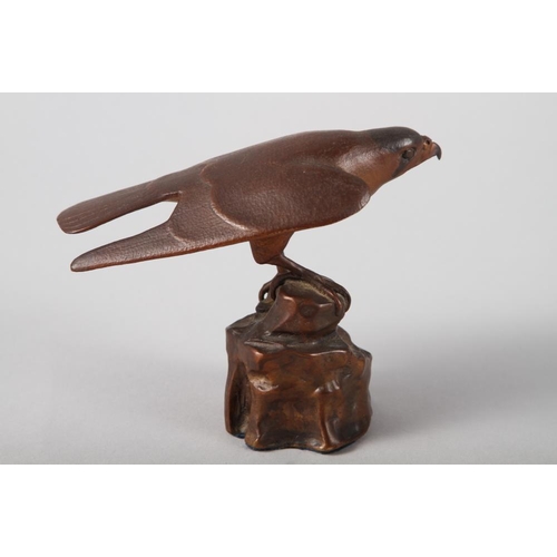 186 - Dave Tomlinson: a signed limited edition bronze, hawk perched on a rock, 4