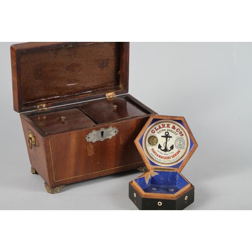 203 - An early Victorian mahogany and brass line inlaid two-division tea caddy with ring handles, 9