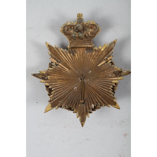 218 - An officer's late 19th century helmet plate for South Lancashire Regiment, 5