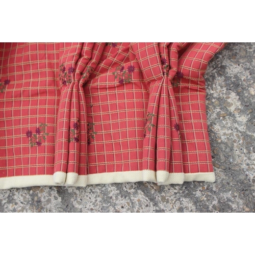 230 - A pair of interlined curtains with a rust red check pattern and embroidered floral sprays, each curt... 