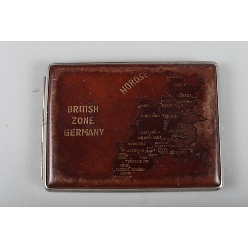 257 - A gentleman's leather cased travelling set, a leather cigarette case showing British Zone Germany, a... 