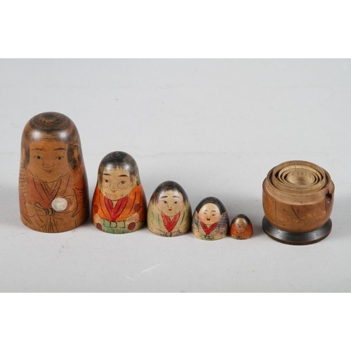 274 - A Kobe nesting doll, a 19th century yew model pail and other decorative items