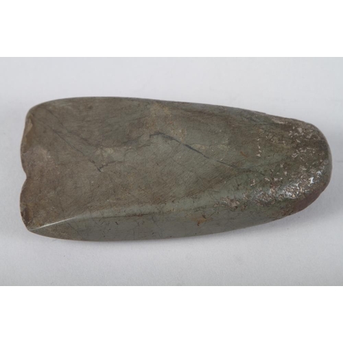 276 - A Maori carved hardstone axehead, collected from Parihaka circa 1880-90, 5 1/2