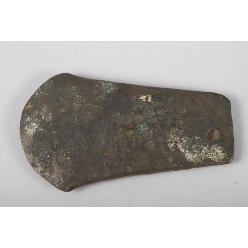 284 - An Iron Age axehead, 4 1/8