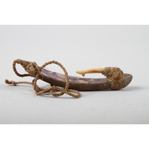 285 - A Maori fish hook, collected circa 1880-90, with curved wooden shank lined with paua shell lure on t... 