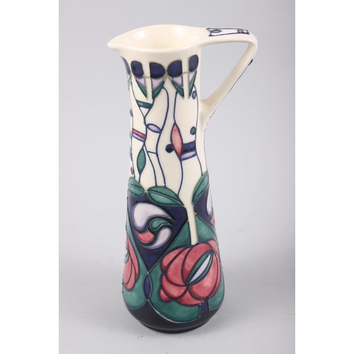 33 - A Moorcroft pottery ewer with Macintosh style decoration, designed by Joanne Morton and Ailie Woodhe... 