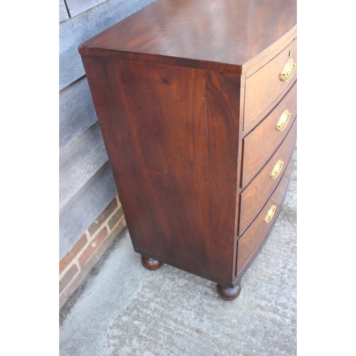 539 - A 19th century mahogany bowfront chest of two short and three long drawers with embossed brass handl... 