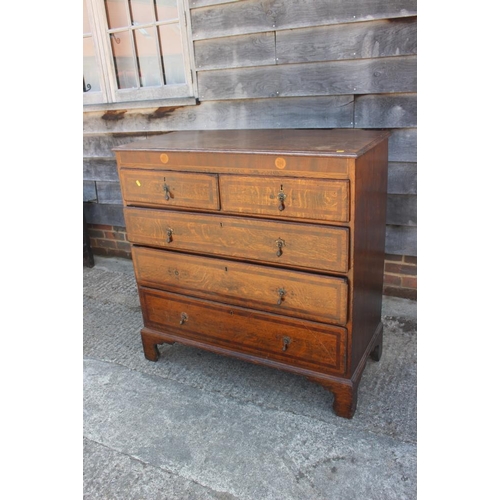 544 - A late 18th century provincial oak and mahogany banded chest of two short and three long graduated d... 