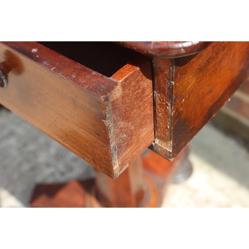 548 - A late 19th century mahogany side table, fitted one drawer, on octagonal faceted column triform base... 