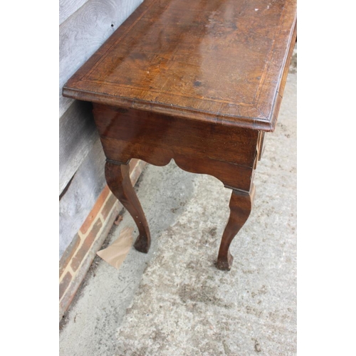 552 - A late 17th century/early 18th century oak lowboy, fitted three drawers over shaped kneehole, on cab... 