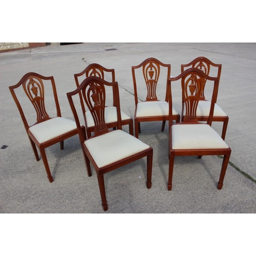 613 - A set of six Hepplewhite design standard dining chairs with drop-in seats