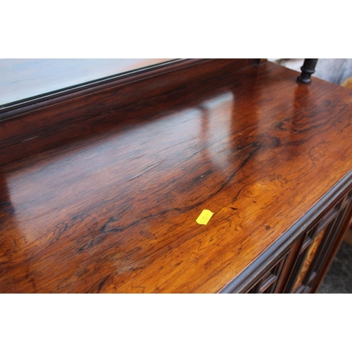 619 - An Edwardian rosewood and inlaid music cabinet with mirror panel back over panelled door, 30