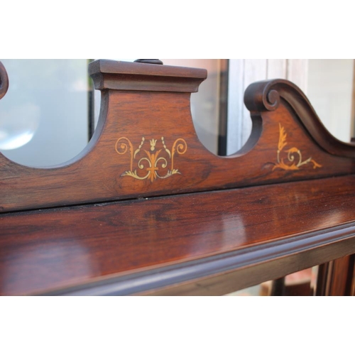 619 - An Edwardian rosewood and inlaid music cabinet with mirror panel back over panelled door, 30