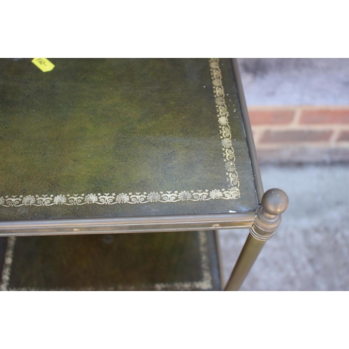 631 - * A brass framed three-tier etagere with green tooled leather inset tops, 12