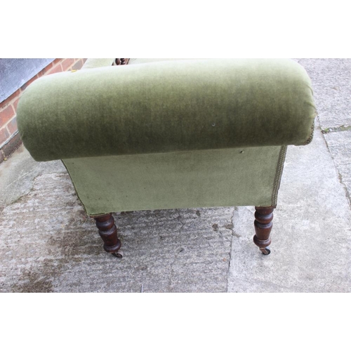 640 - An early 20th century polished as mahogany chaise longue with spindle back, upholstered in a green v... 