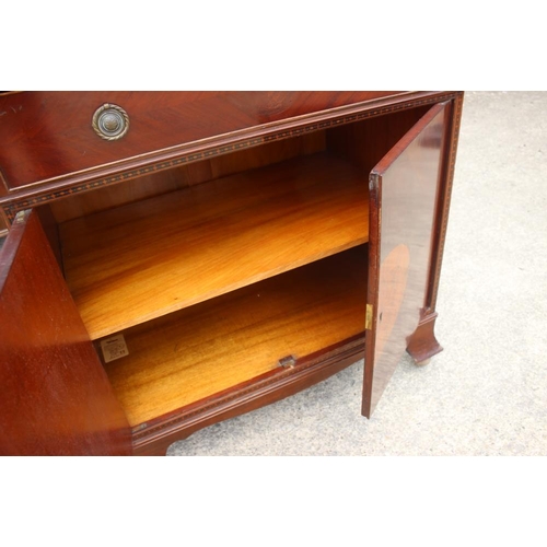 644 - A mahogany and box line inlaid bookcase, the upper section enclosed lattice glazed doors over one dr... 