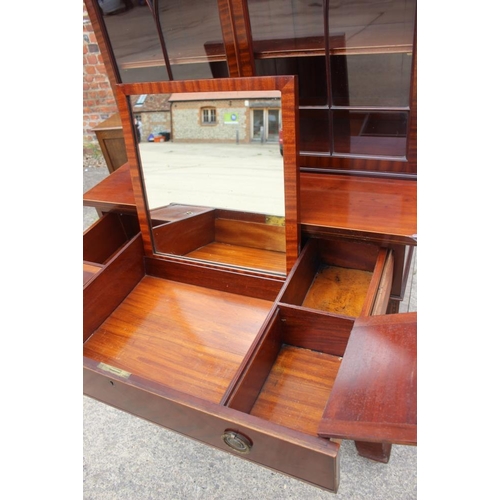 644 - A mahogany and box line inlaid bookcase, the upper section enclosed lattice glazed doors over one dr... 