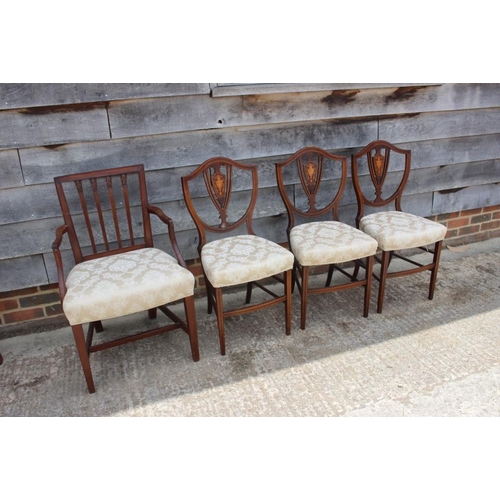 649 - Three mahogany and string inlaid shield back side chairs, upholstered in a cream brocade, on turned ... 