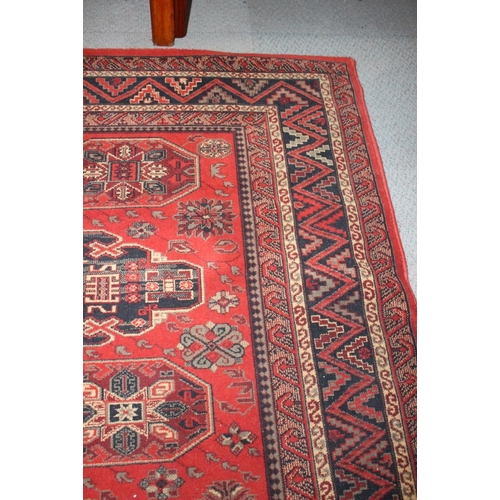 763 - A Royal Keshan carpet of traditional Persian design with four medallions on a red ground, 120” x 78”... 