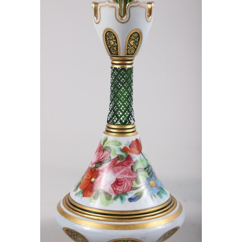 77 - A Bohemian overlaid and enamel scent bottle, decorated flowers, 9 1/2