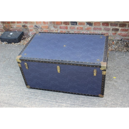 778 - A travel trunk with brass mounts