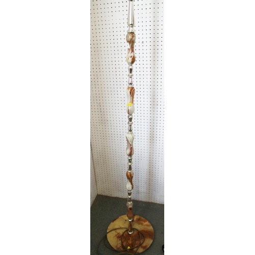 293 - A turned onyx and plastic standard lamp, on circular base, 55