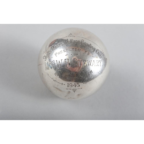 335 - A mid 20th century silver bowling trophy, designed as a jack, 8.9oz troy approx (dented)