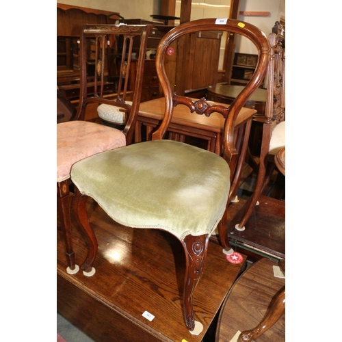 558 - A mahogany loop back occasional chair, upholstered in a green velour, on cabriole supports, a 17th c... 