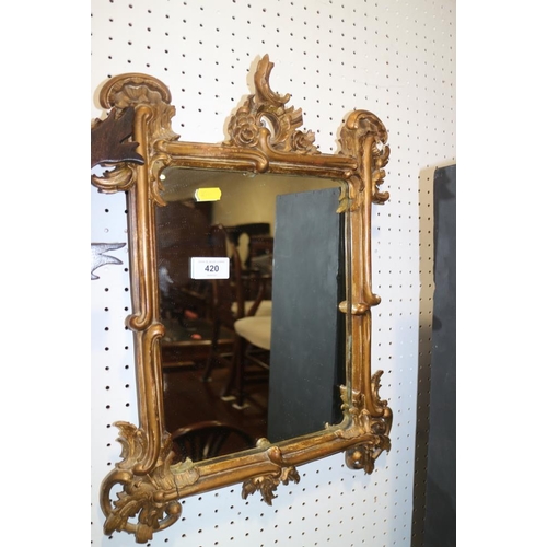 602 - A late Victorian carved giltwood mirror, 12