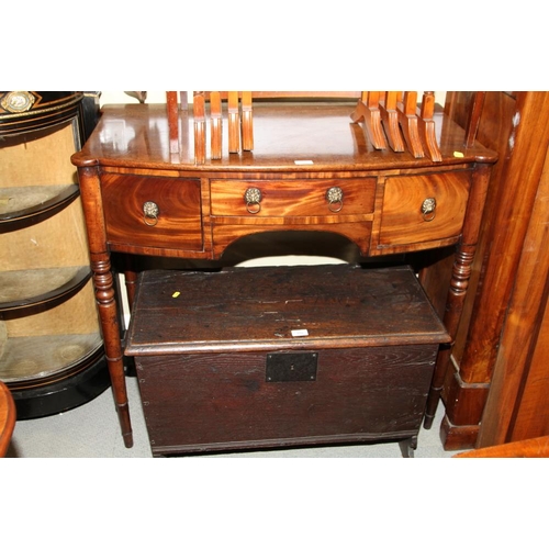 549 - A late Georgian mahogany bowfront carving table, fitted one shallow and two deep drawers, on turned ... 