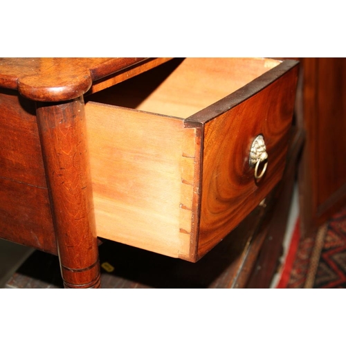 549 - A late Georgian mahogany bowfront carving table, fitted one shallow and two deep drawers, on turned ... 