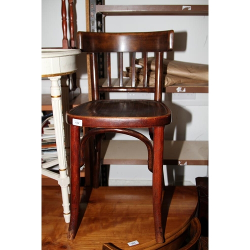 652 - A set of four Thonet style bentwood cafe chairs with panel seats, stamped XXXI to base
COLLECT