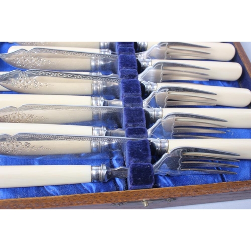 328 - A set of six sterling silver slip top coffee spoons, in case, a set of fish knives and forks, in oak... 