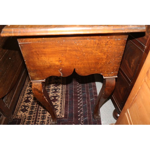 552 - A late 17th century/early 18th century oak lowboy, fitted three drawers over shaped kneehole, on cab... 