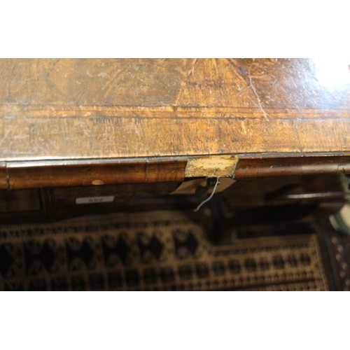 552 - A late 17th century/early 18th century oak lowboy, fitted three drawers over shaped kneehole, on cab... 