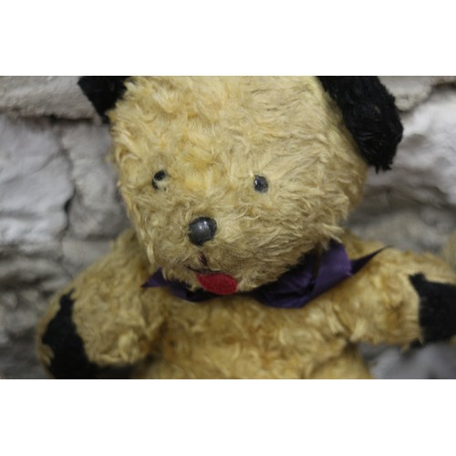 223 - A vintage teddy bear, a toy terrier, a koala bear, an Indian doll and other toys