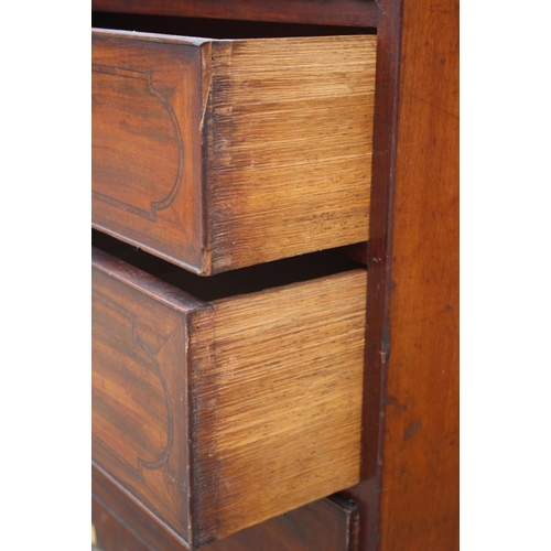 503 - A 19th century mahogany and line inlaid secretaire chest with fitted interior over three long gradua... 